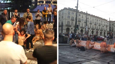 Nudi e incatenati bloccano il ponte di Piazza Vittorio a Torino in pieno  centro: il blitz degli ambientalisti e traffico nel caos