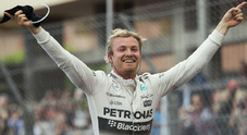 Vince Rosberg, 2° Vettel con la Ferrari davanti al Hamilton
