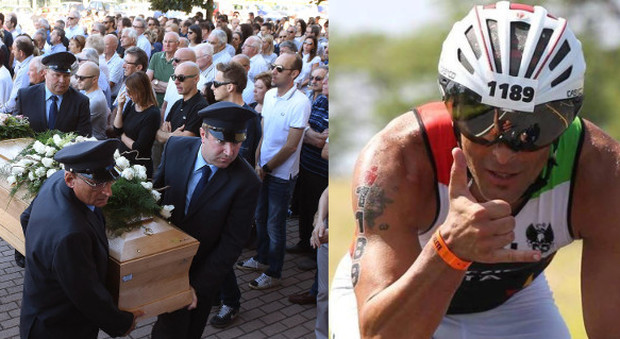 In mille per l'addio al triatleta: «Ciao papi sarai sempre il mio eroe»
