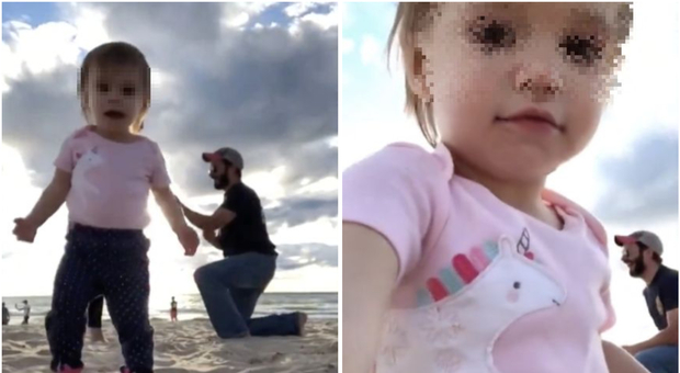Figlia piccola interrompe la proposta di matrimonio del papà in riva al mare e il video diventa virale