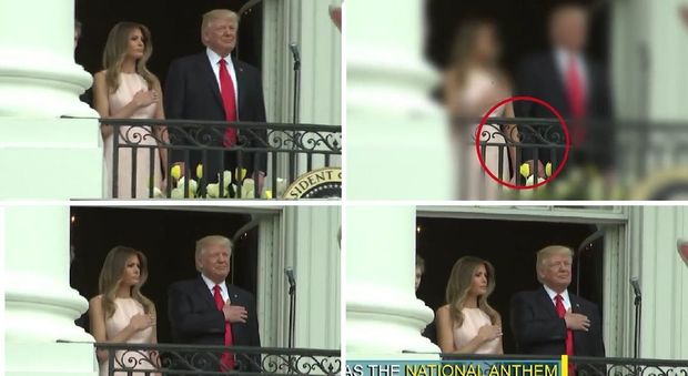 Melania e il colpetto sulla mano a Donald durante l'inno Usa