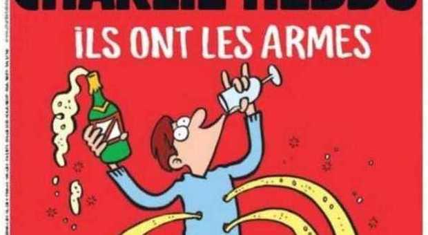 Charlie Hebdo: loro hanno armi, noi champagne. La copertina dopo le stragi di Parigi