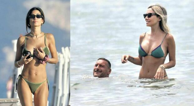 Francesco Totti e Noemi Bocchi, l'arrivo della coppia a Sabaudia: fan all'assalto. I due pizzicati con gli amici al mare