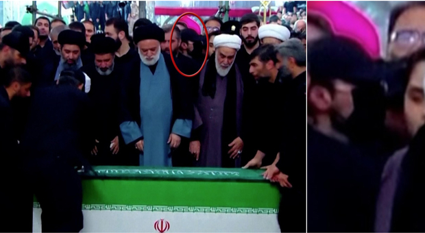 https://statics.cedscdn.it/photos/MED/2026/07/10/9643811_10180212_khamenei_uomo_mascherina_funerali_figlio_mojtaba.jpg