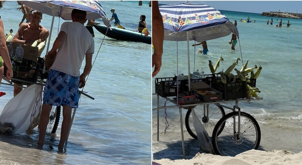 Ugento spiagge, venditore ambulante con barbecue vende pannocchie a Torre San Giovanni