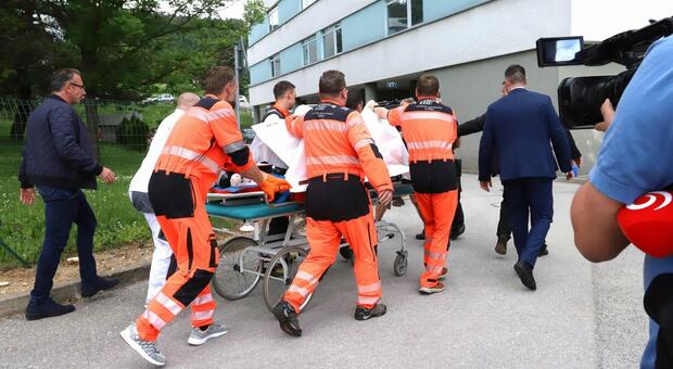 Picture taken on May 15, 2024 shows Slovak Prime Minister Robert Fico being transported by medics and his security detail to the hospital in Banska Bystrica, Slovakia where he is to be treated after he had been shot "multiple times" (Photo by AFP)