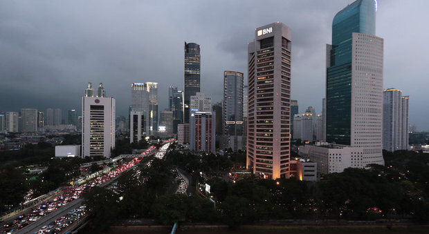 The central business district skyline is seen at dusk on Monday in Jakarta, Indonesia. Dita Alangkara/AP