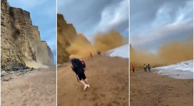 Crolla scogliera, turisti in spiaggia scappano terrorizzati: l'enorme frana ripresa in un video. «Rocce come automobili»