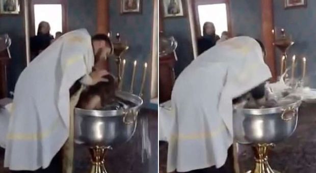 Il prete immerge la bimba con violenza inaudita: il video del battesimo scatena le polemiche