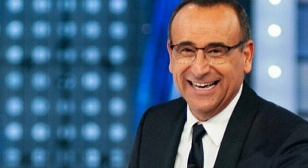 Carlo Conti conduce Con il cuore , il concerto benefico stasera ad Assisi, dal vizio delle donne alla passione per l'abbronzatura: le curiosità Carlo Conti conduce Con il cuore , il concerto benefico stasera ad Assisi, dal vizio delle donne alla passione per l'abbronzatura: le curiosità