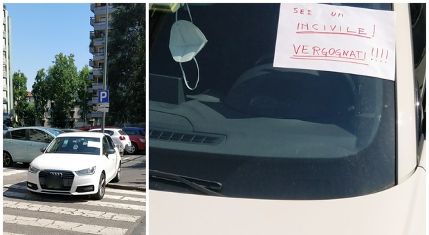 Milano, auto posteggiata sulle strisce pedonali: cartello di protesta lasciato sul parabrezza FOTO