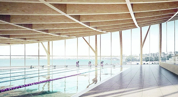 Il rendering dello stadio del nuoto per i Giochi del Mediterraneo 2026