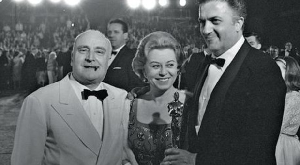 nella foto: Angelo Rizzoli, Giulietta Masina, Federico Fellini