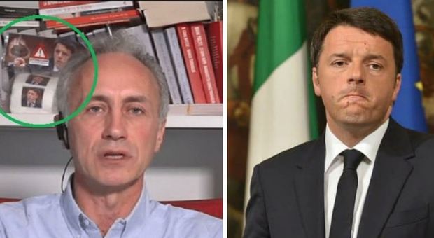 la carta igienica con la faccia di Renzi dietro ravaglio in tv su
