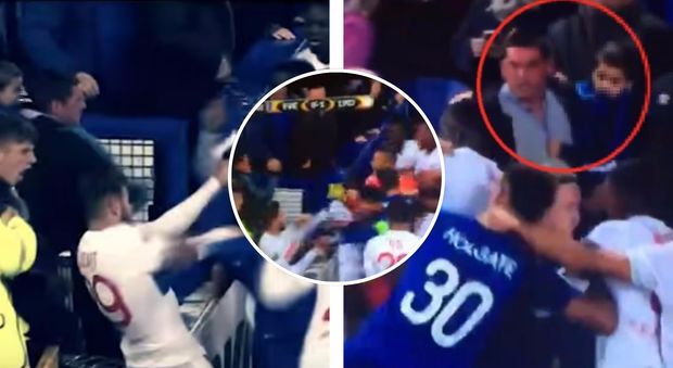 Rissa a bordo campo, tifoso col bimbo in braccio dà un pugno al portiere francese durante Everton-Lione: le immagini