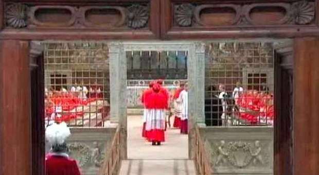 Cardinals enter the Sistine Chapel for the Conclave