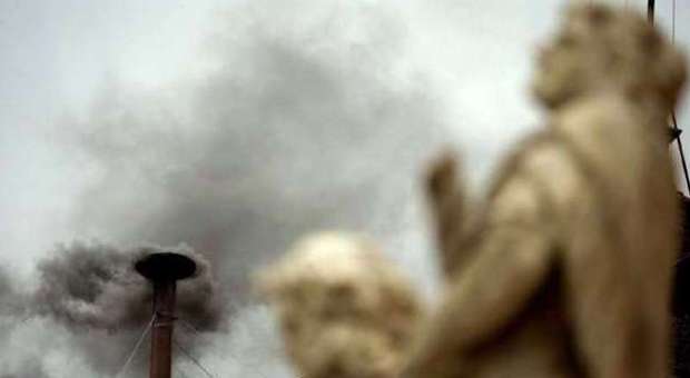 Black smoke billows from the chimney of the Sistine Chapel (G. Borgia / Ap Photo)