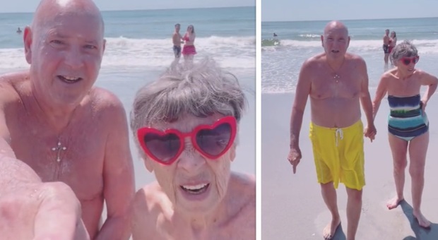 Selfie di coppia in spiaggia, nel video appare un «segnale dal futuro». Social impazziti: «Siamo io e te»