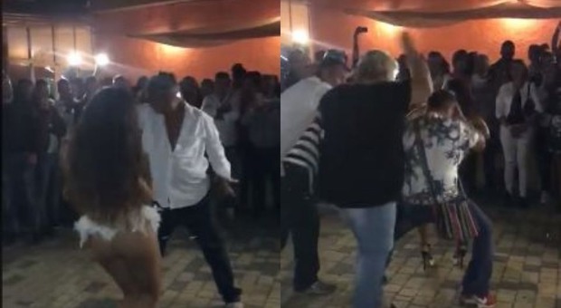 Marito balla con la sexy ballerina, la moglie entra in pista e lo riempie di botte