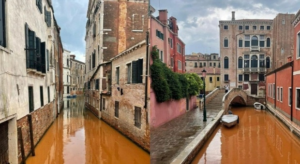 Tempesta su Venezia, il campo da tennis "si scioglie" e l'acqua in canale diventa rossa (dalla pagina Facebook "Venezia non è Disneyland")
