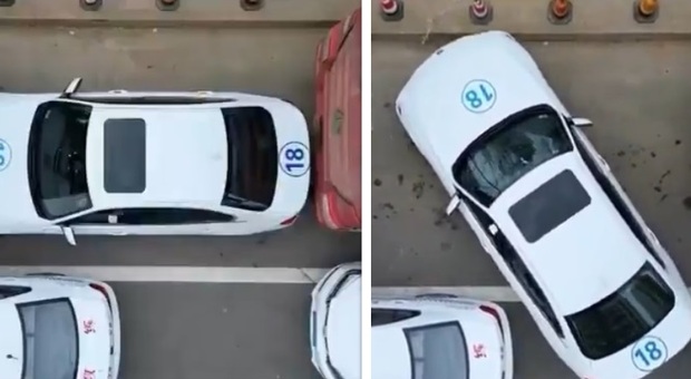Bloccato tra i camion e da due auto in doppia fila: la manovra impossibile per uscire dal parcheggio (in un solo minuto) VIDEO