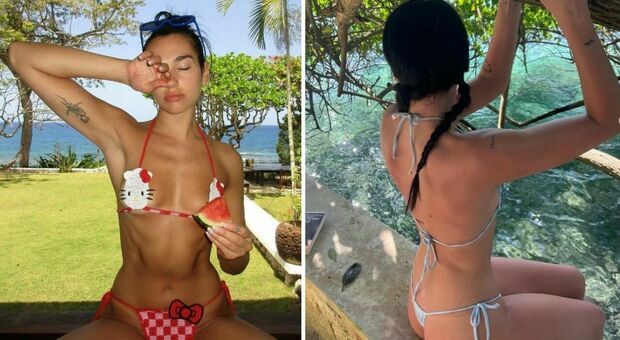 Dua Lipa, il micro bikini di Hello Kitty lancia la moda estiva: le foto della fuga tropicale infiammano il web