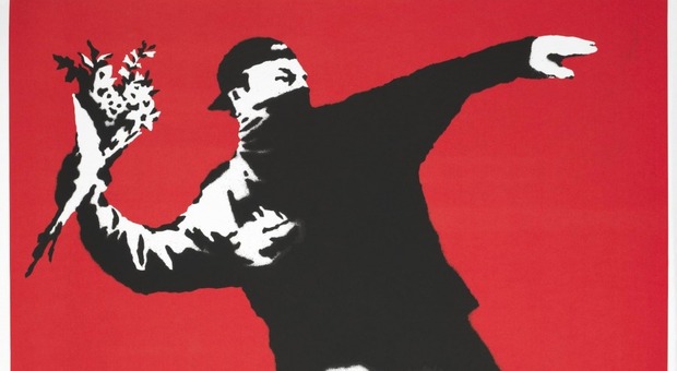 L'opera "Love is in the air" di Banksy