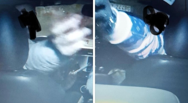 I due ladri mentre tentano di rubare un'auto in via Monteresegone, al Tufello