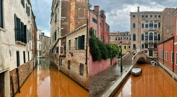 Venezia , arriva la tempesta: il campo da tennis "si scioglie" e l'acqua del rio diventa rossa