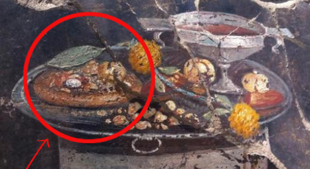 Pompei, scoperta l'«antenata» della pizza in un affresco di 2000 anni fa: il murale era nell'atrio di una casa vicino un panificio