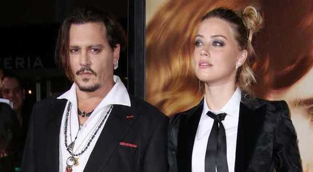 Johnny Depp ancora sovrappeso sul red carpet con la fidanzata