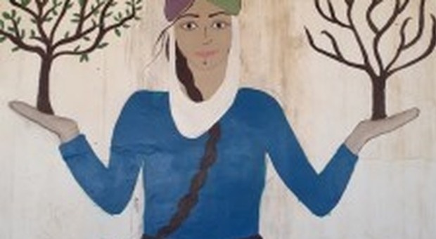 Murales simbolo di Jinwar, la comune femminile siriana