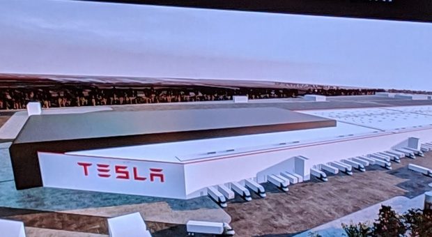 Il rendering di una fabbrica Tesla