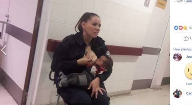 La poliziotta allatta il bimbo denutrito di una donna arrestata e ottiene la promozione