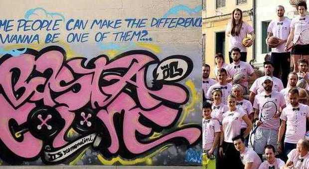 Un murales rosa sul muro della scuola lancia il suo messaggio