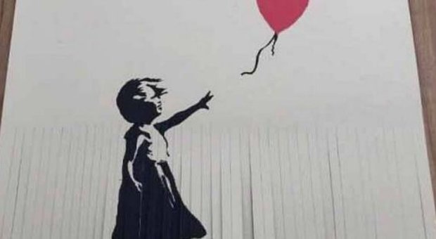 Fa a striscioline stampa di Banksy da 40mila sterline per aumentarne il valore: ora vale un pound