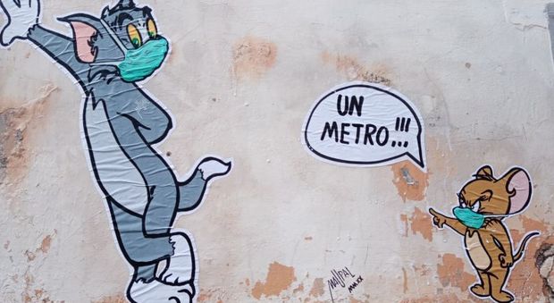 Tom&Gerry al tempo del Covid: “Un metro”, il nuovo graffito di Maupal a Borgo