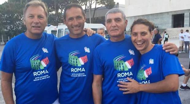 Quattro olimpionici corrono per i Giochi olimpici a Roma
