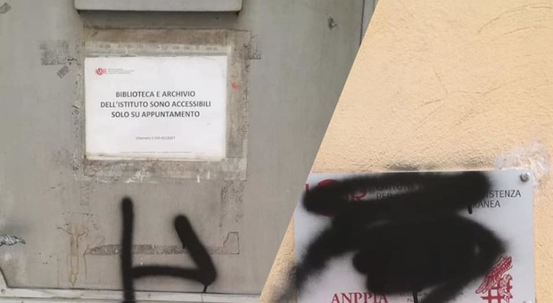 Fascio littorio e la targa imbrattata con vernice nera alla sede dell'Anpi a Verona