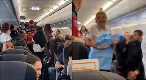 Donna partorisce sull'aereo poco prima del decollo: i passeggeri riprendono l'incredibile scena