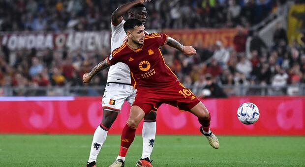 RomaÕs Leandro Paredes (R) in action against GenoaÕs Caleb Ekuban (L) during the Serie A soccer match between AS Roma and Genoa CFC at the Olimpico stadium in Rome, Italy, 19 May 2024. ANSA/RICCARDO ANTIMIANI