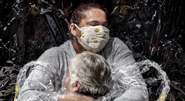 World Press Photo of the Year: Mads Nissen, The First Embrace
