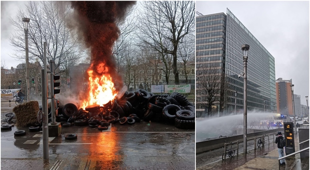 Trattori, agricoltori in protesta a Bruxelles: sale tensione con roghi, esplosioni e idranti