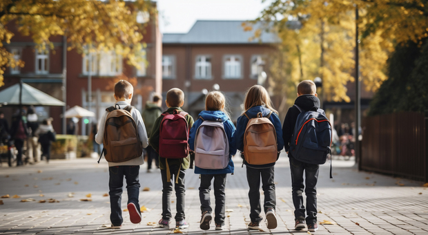 https://statics.cedscdn.it/photos/MED/90/80/8619080_27091208_view_young_students_attending_school.jpg