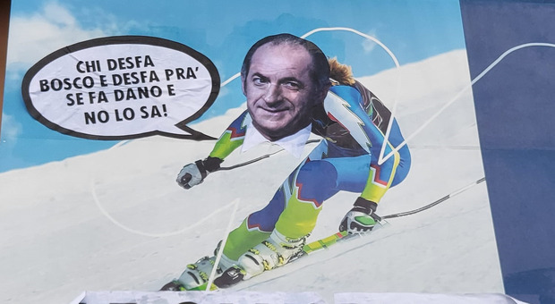 «Olimpiadi dell'insostenibilità»: imbrattato il manifesto dei Giochi nel palazzo della Regione. E Zaia diventa "sciatore"