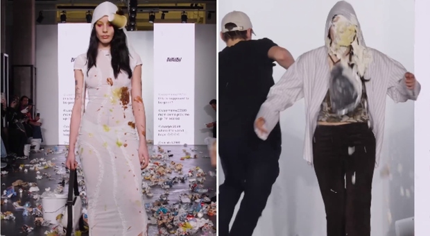 Milano Fashion Week, cibo e spazzatura contro le modelle in passerella: «Come l'odio riversato sui social». Poi torta in faccia alla stilista