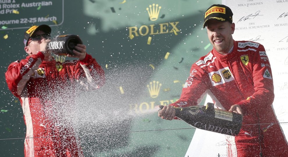 Vettel e Raikkonen festeggiano la vittoria