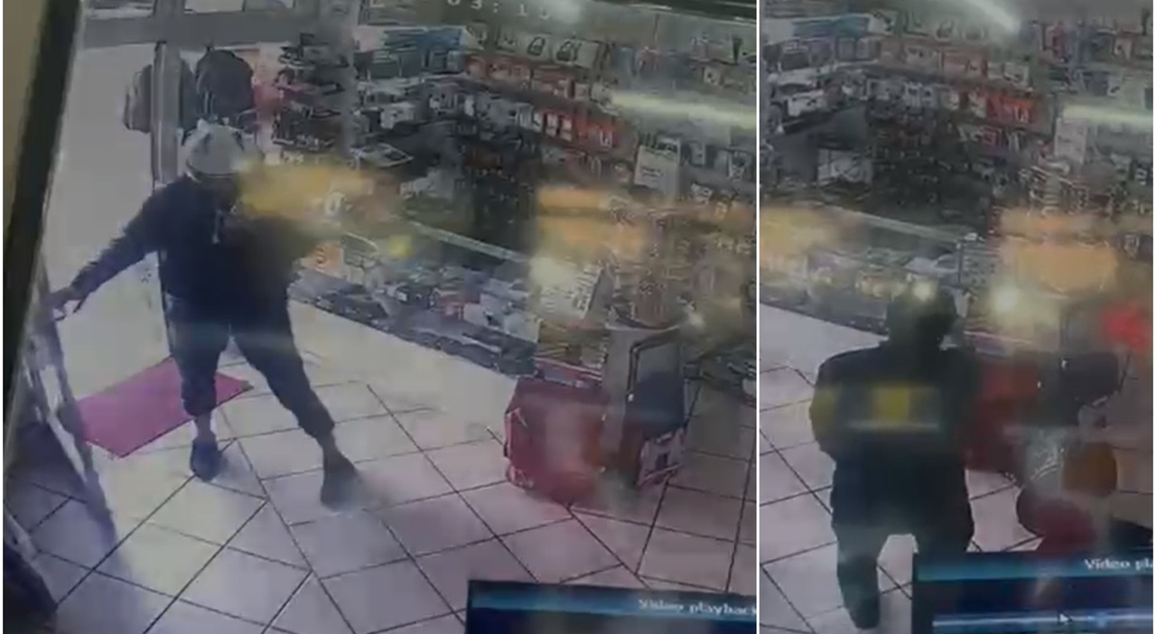 Rapina audace a Roma: un bandito con casco e il momento di tensione nel negozio