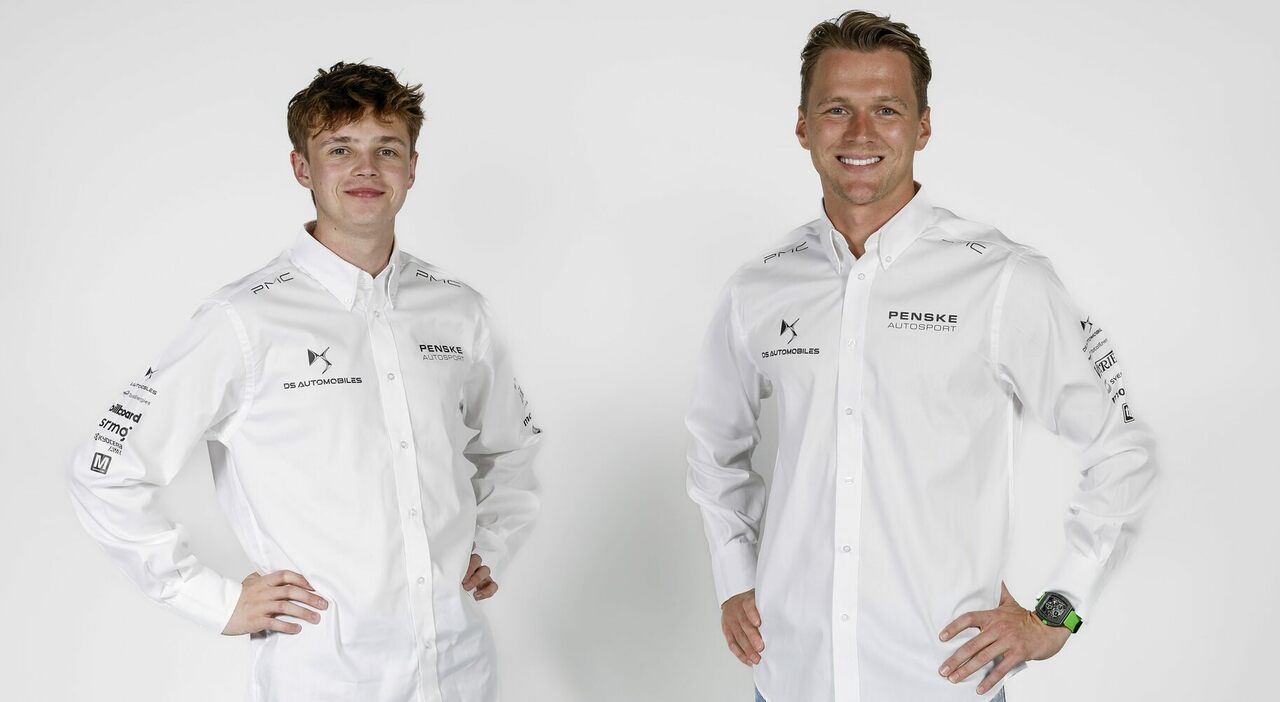 A woman with long dark hair posing