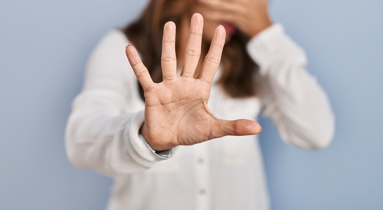 https://statics.cedscdn.it/photos/MED_HIGH/2026/07/13/9648735_13141304_hispanic_woman_standing_isolated_background_covering_eyes_with_hands_doing_stop_gesture_with_sad_fear_expression_embarrassed_negative_concept_1_.jpg